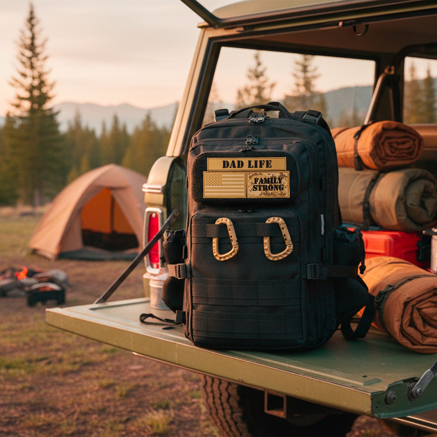 Dad diaper bag Backpack with 'Dad Life' and 'Family Strong' text on a van at a camping site.