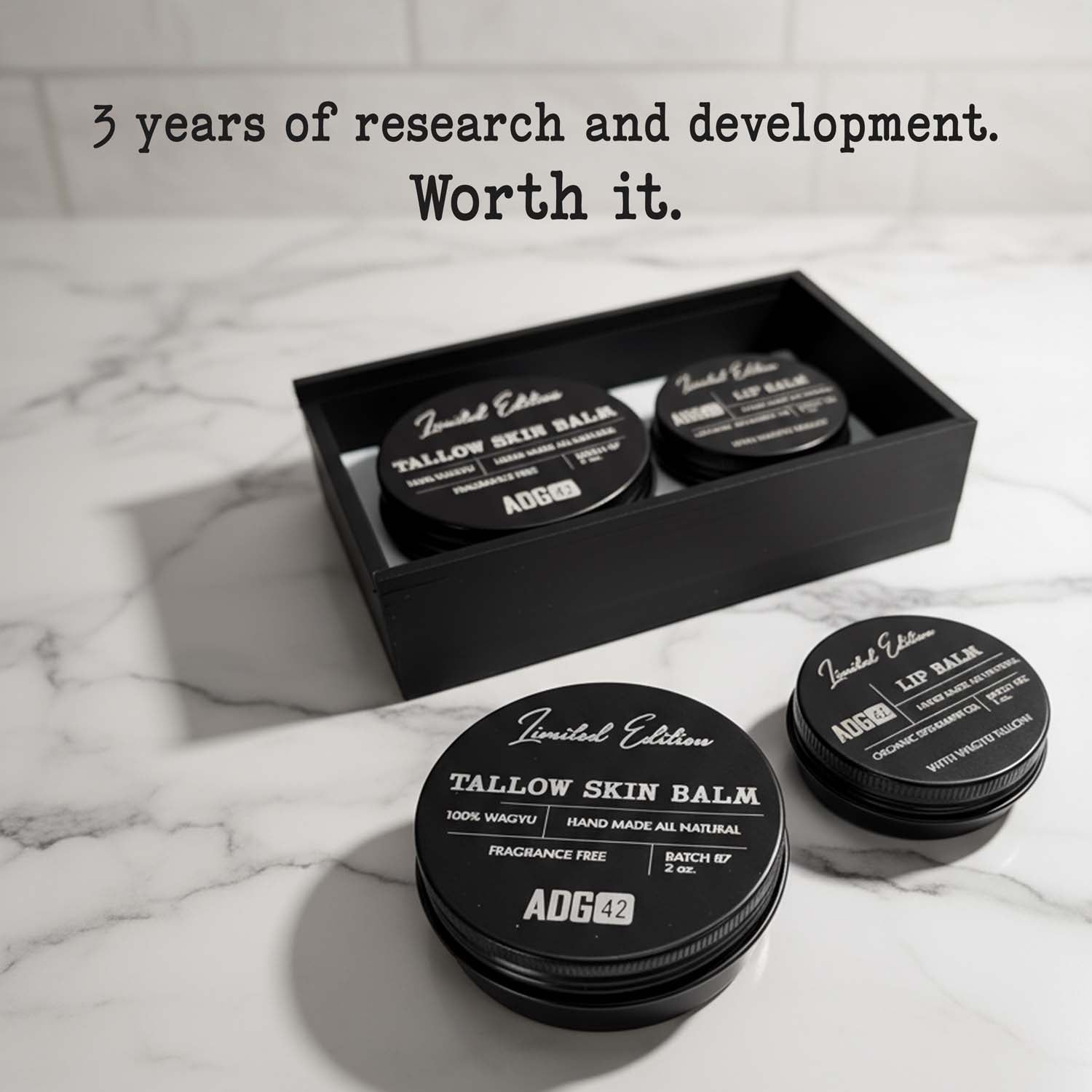 Set of ADG balm containers on a marble surface with text about research and development.