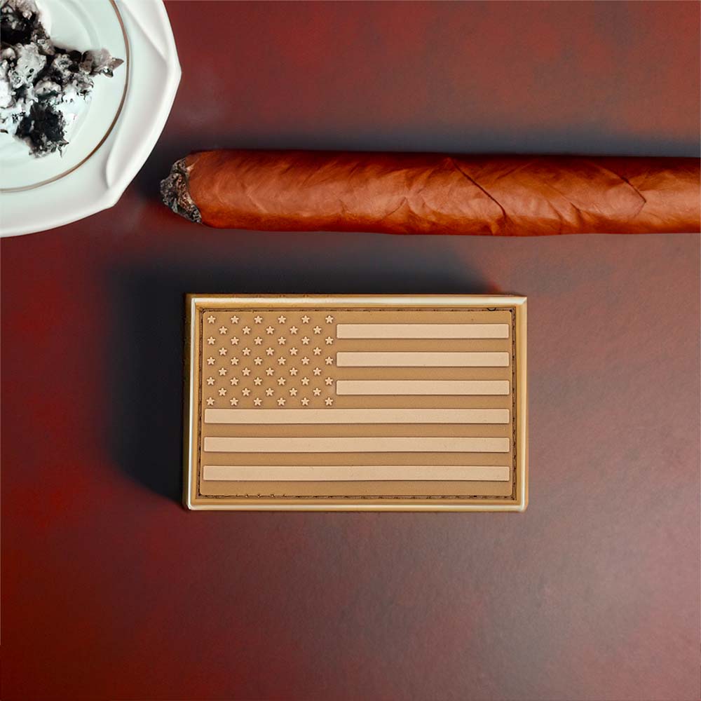 Desert Tan USA Flag Patch shown with a cigar